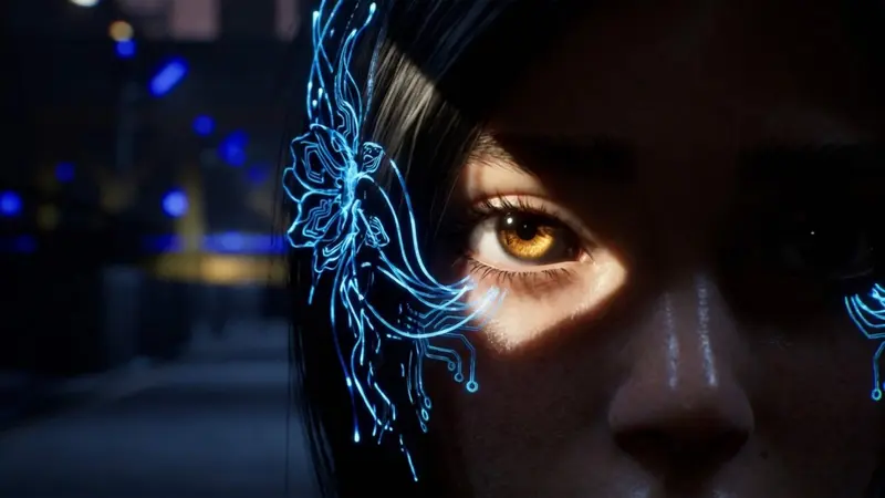 An extreme close-up of a face with an amber eye and glowing blue circuitry tracing the temple, from HARDWIRED: Ghost in the Reset