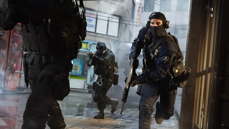 Three Modern Warfare 4 operators advancing through a rain-slicked East Asian city street lined with shopfronts and signage on the Silkworm map